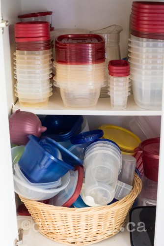 photo of cupboard showing storage containers